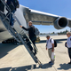 Passengers board a C-5 Galaxy at Moffett Airfield, California.